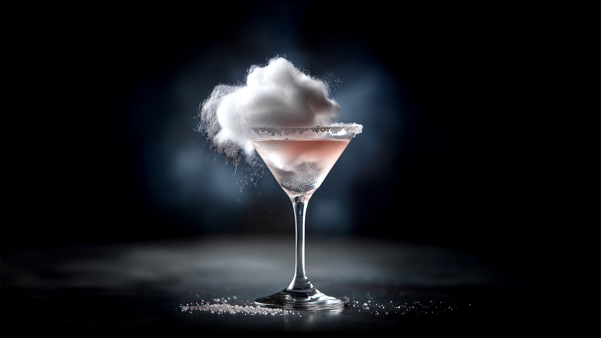 Ein Cocktailglas mit rosa Getränk, garniert mit einer schwebenden weißen Zuckerwattewolke.